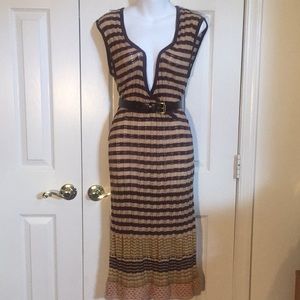 Long, low cut sweater dress.